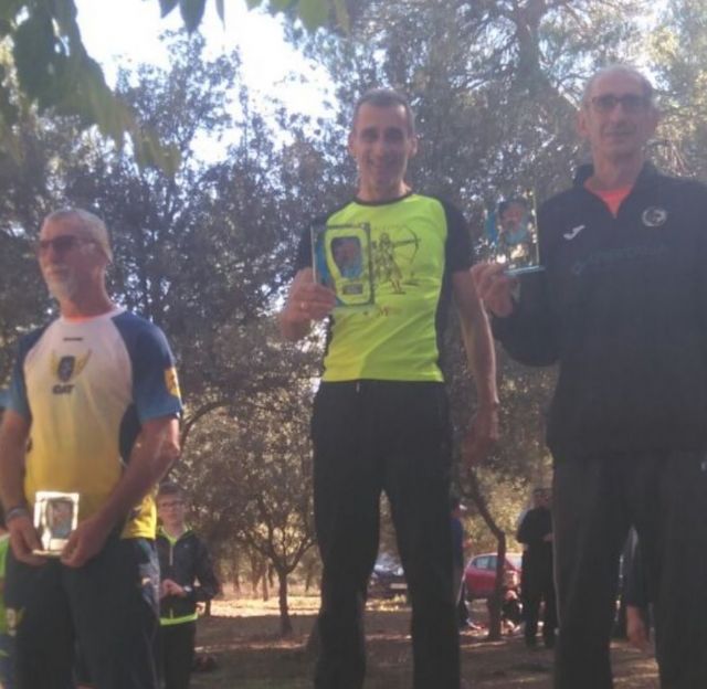 Podio de Juan Francisco García, del Club Atletismo Totana, en la IX Ruta del Jamón de María